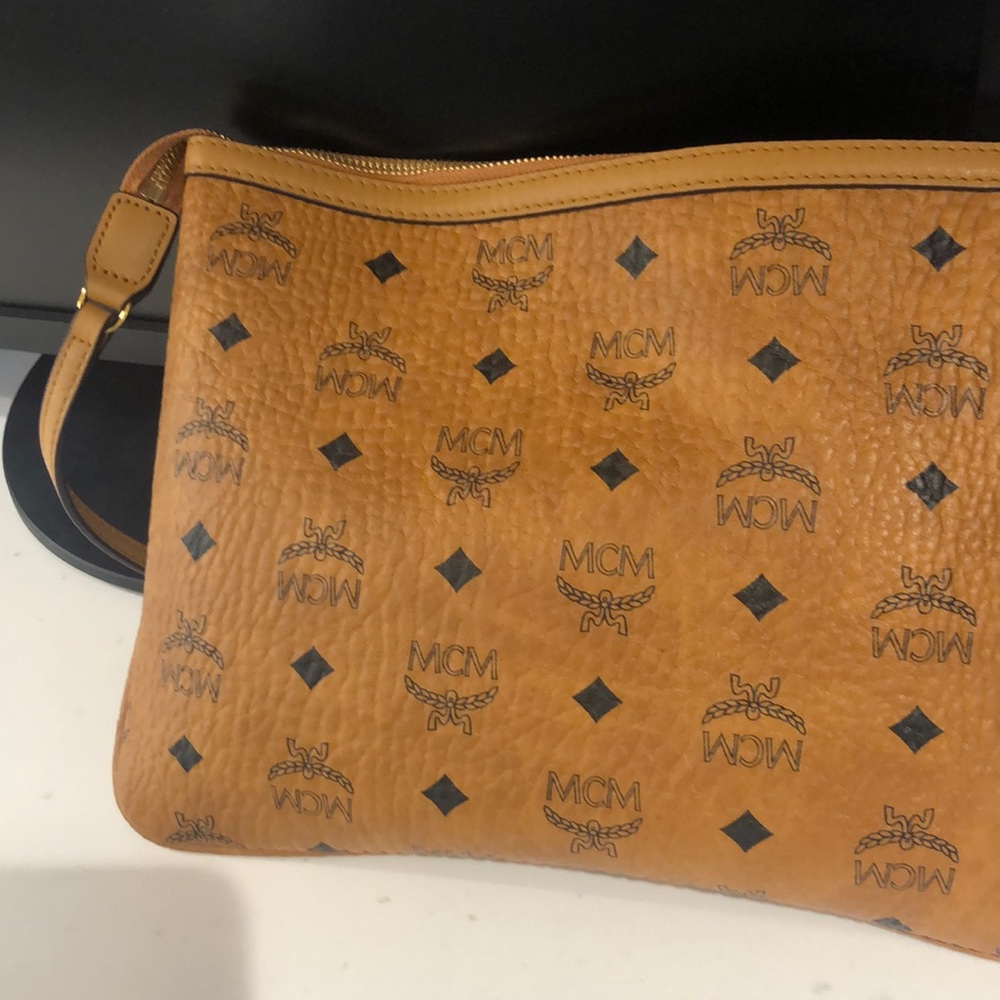 I’m selling my newly used clutch MCM bag.